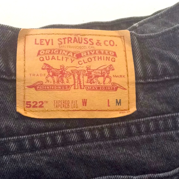 Levi’s Black Denim Women’s Tapered fit 24 Med - Picture 2 of 5